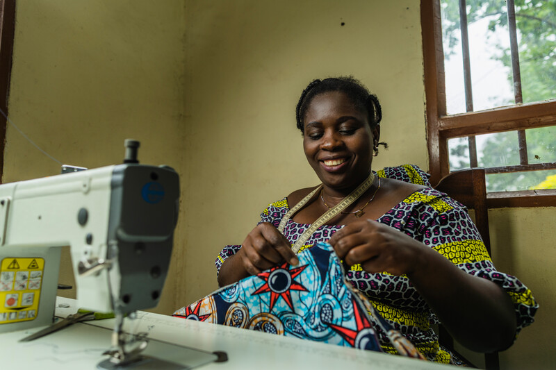 Masika Sakina Salambongo working in the Rumangabo Sewing Workshop. 