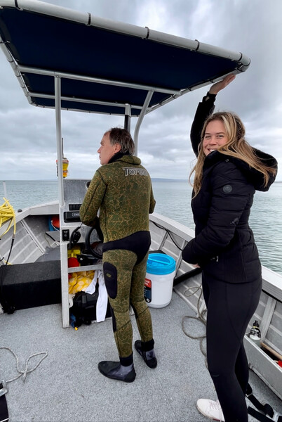 Justine Gordon and Steve McLeod from Oceanreef Aquaculture sailing out of Rosebud Harbor, Australia. (Photo by Christina Biggs/Re:wild)